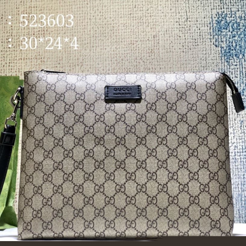 G*u*i clutch bags